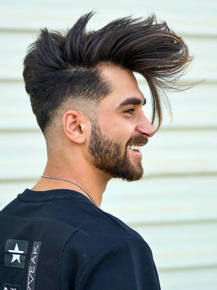 Exceptionally High Volume Top with Sharp Mid Fade hairstyle