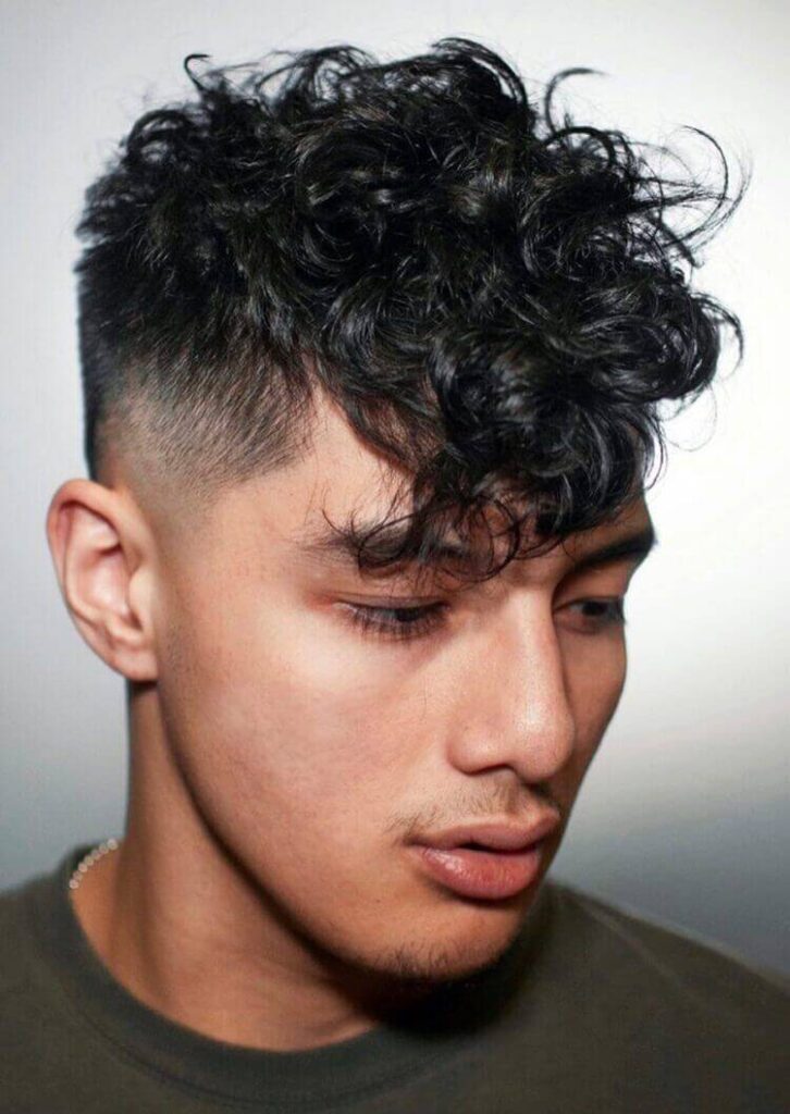 Curled Top with Neat Faded Sides haircut