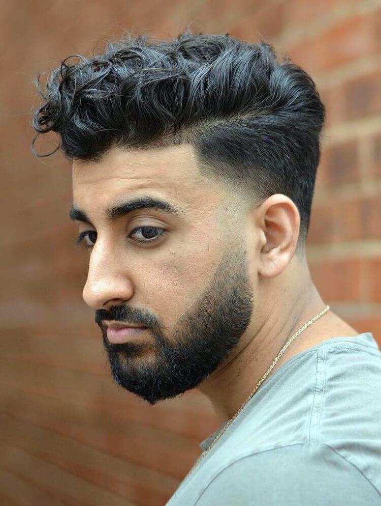 High Volume Wavy Top with Temple Fades haircut