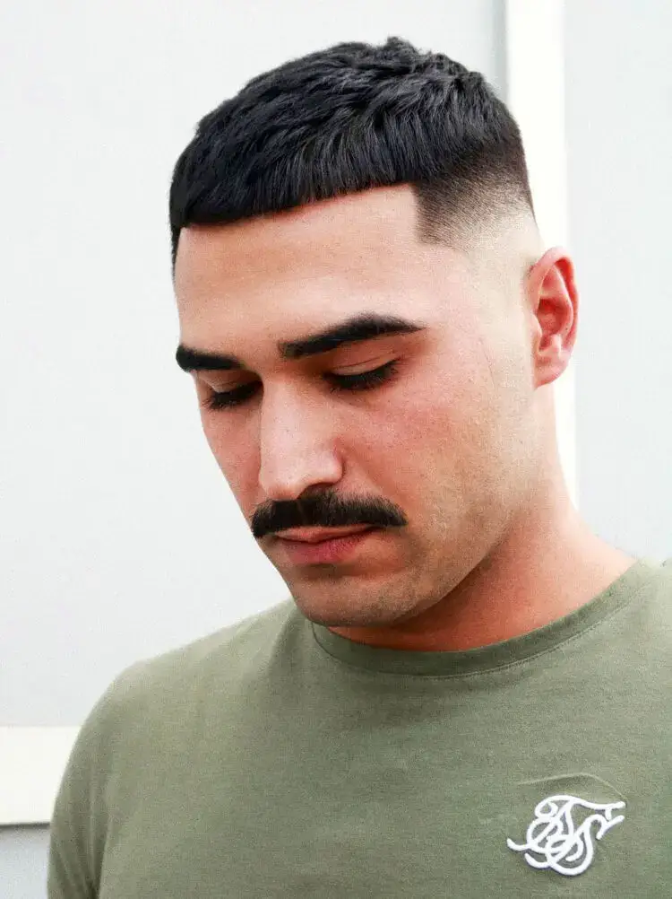 Neat Skin Fade with Straight Fringe haircut