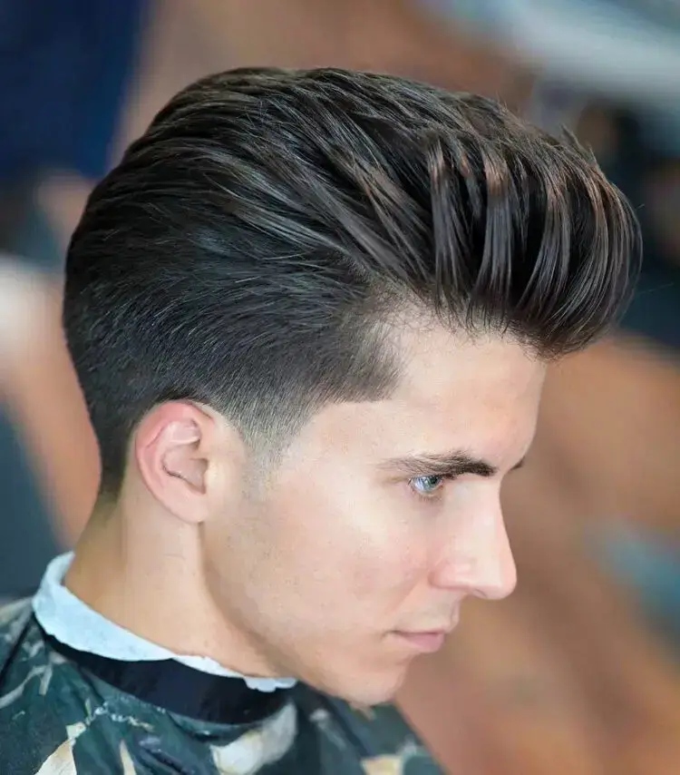 Pompadour with tapered sides hairstyle